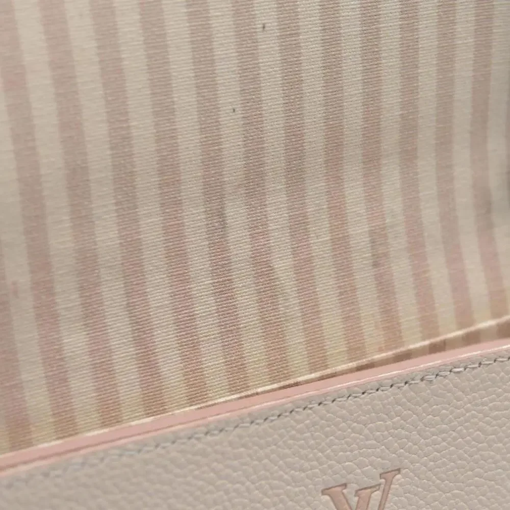 Louis Vuitton House's signature Monogram Pochette Felicie